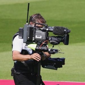 First Test: England v Sri Lanka – Day One LONDON - MAY 11: Marcus Trescothick (R) of England and Andrew Strauss of England walk to the crease filmed by a television cameraman during day one of the first npower Test match between England and Sri Lanka at Lord's on May 11, 2006 in London, England. (Photo by Mike Hewitt/Getty Images)